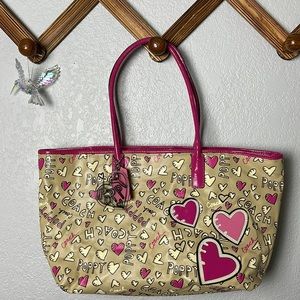 Coach pink heart print poppy purse
